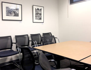 The meeting room at Maddens Lawyers with my prints.