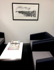 The waiting room at Maddens Lawyers with my print.